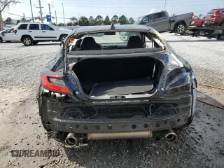 2023 Toyota GR86 with VIN JF1ZNBC18P8762759, listed as a Copart auction lot 42394545 with 16,469 mi miles and Salvage Title. Bid and sale history available at carsss.com. Image 6.