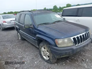2003 Jeep Grand Cherokee Laredo with VIN 1J4GW48S63C591605, listed as a IAAI auction lot 42389898 with 177,024 mi miles and . Bid and sale history available at DreamBid. Image 1.