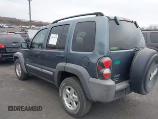 2002 Jeep Liberty Sport with VIN 1J8GL48K62W298212, listed as a IAAI auction lot 41918130 with 226,299 mi miles. Bid and sale history available at carsss.com. Image 3.