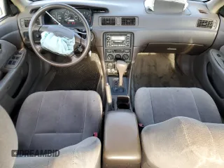 1999 Toyota Camry LE с VIN 4T1BG22K7XU516756, выставлен на аукционе Copart как лот 54065105 с пробегом 176 051 миль миль и Списание • Salvage title. История ставок и продаж доступна на DreamBid. Изображение 8.