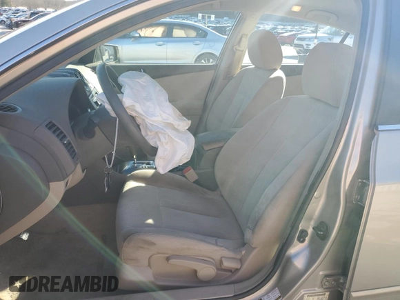 2010 Nissan Altima 2.5 S with VIN 1N4AL2AP9AC172584, listed as a Copart auction lot 83541234 with 124,004 mi miles and Salvage Title. Bid and sale history available at carsss.com. Image 7.