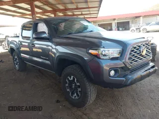 2022 Toyota Tacoma SR z VIN 3TYCZ5AN1NT062445, wystawiony jako IAAI lot #41967336 z przebiegiem Nie podano mil oraz . Historia ofert i sprzedaży dostępna na DreamBid. Obrazek 1.
