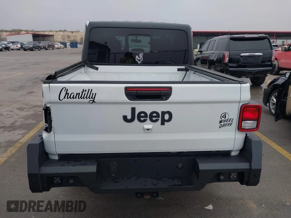2021 Jeep Gladiator Willys with VIN 1C6HJTAG1ML575474, listed as a IAAI auction lot 41439898 with 44,335 mi miles and . Bid and sale history available at DreamBid. Image 17.