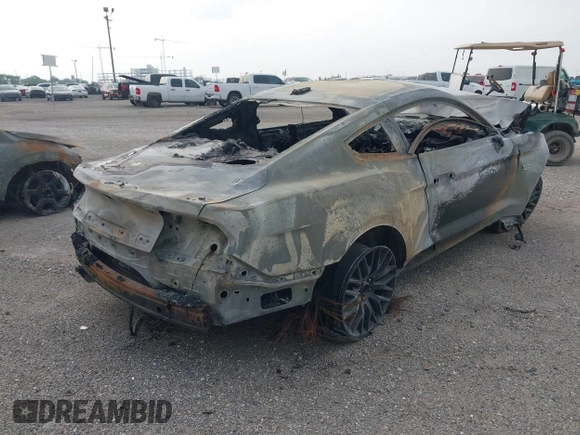 2020 Ford Mustang GT with VIN 1FA6P8CF8L5174979, listed as a IAAI auction lot 41798920 with 59,558 mi miles and . Bid and sale history available at DreamBid. Image 4.