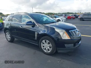 2014 Cadillac SRX z VIN 3GYFNAE35ES627243, wystawiony jako IAAI lot #42355141 z przebiegiem 99 885 mil mil oraz . Historia ofert i sprzedaży dostępna na DreamBid. Obrazek 1.