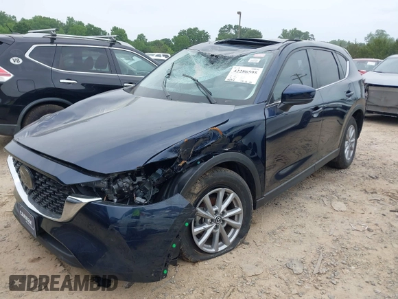 2023 Mazda CX-5 S Carbon Edition z VIN JM3KFBCM6P0251947, wystawiony jako IAAI lot #42286595 z przebiegiem 9 434 mil mil oraz . Historia ofert i sprzedaży dostępna na DreamBid. Obrazek 22.