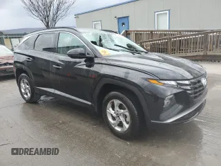 2023 Hyundai Tucson SEL with VIN 5NMJBCAE2PH270674, listed as a Copart auction lot 82879614 with 11,673 mi miles and Salvage Title. Bid and sale history available at DreamBid. Image 4.
