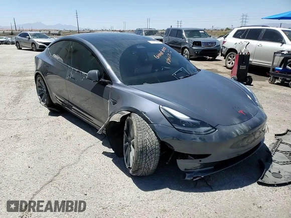 2022 Tesla Model 3 Long Range z VIN 5YJ3E1EBXNF263832, wystawiony jako Copart lot #57177445 z przebiegiem Nie podano mil oraz Szkoda całkowita • Salvage title. Historia ofert i sprzedaży dostępna na DreamBid. Obrazek 13.
