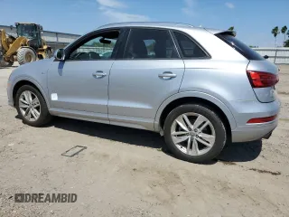 2018 Audi Q3 Premium z VIN WA1BCCFS3JR016890, wystawiony jako Copart lot #52594015 z przebiegiem 63 871 mil mil oraz Szkoda całkowita • Salvage title. Historia ofert i sprzedaży dostępna na DreamBid. Obrazek 2.