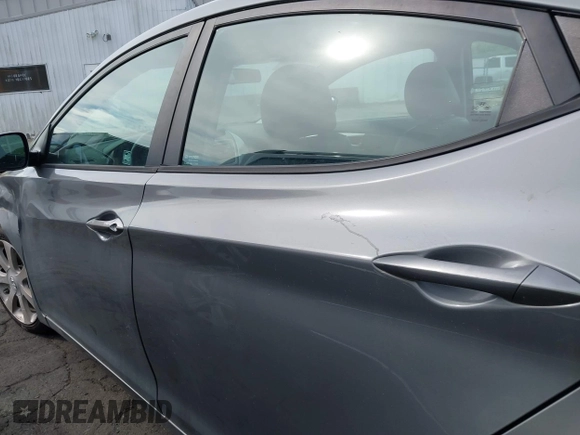2013 Hyundai Elantra Limited z VIN 5NPDH4AEXDH384227, wystawiony jako IAAI lot #42106321 z przebiegiem 145 862 mil mil oraz . Historia ofert i sprzedaży dostępna na DreamBid. Obrazek 14.