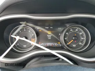 2015 Jeep Cherokee Trailhawk z VIN 1C4PJMBS2FW610618, wystawiony jako Copart lot #52243625 z przebiegiem 136 234 mil mil oraz Szkoda całkowita • Salvage title. Historia ofert i sprzedaży dostępna na DreamBid. Obrazek 9.