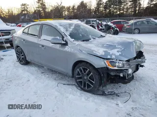 2018 Volvo S60 Dynamic with VIN YV140MTL2J2460002, listed as a IAAI auction lot 41380298 with 58,974 mi miles. Bid and sale history available at carsss.com. Image 1.