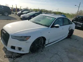 2016 Audi S6 Premium Plus z VIN WAUF2AFC8GN090536, wystawiony jako Copart lot #53939585 z przebiegiem 141 333 mil mil oraz Szkody całkowita. Historia ofert i sprzedaży dostępna na DreamBid. Obrazek 13.