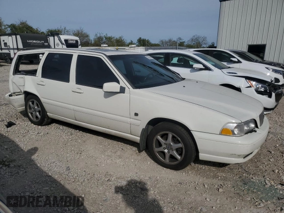 2000 Volvo V70 with VIN YV1LW61J5Y2731717, listed as a Copart auction lot 73036744 with 0 mi miles and Salvage Title. Bid and sale history available at carsss.com. Image 4.