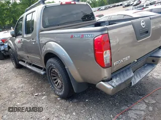 2005 Nissan Frontier LE with VIN 1N6AD07UX5C447844, listed as a IAAI auction lot 42184393 with 202,226 mi miles and . Bid and sale history available at DreamBid. Image 3.