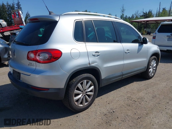 2011 Volkswagen Tiguan SE with VIN WVGBV7AX7BW529097, listed as a IAAI auction lot 42182690 with 139,878 mi miles and . Bid and sale history available at DreamBid. Image 4.