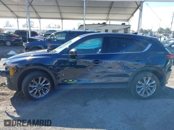 2020 Mazda CX-5 Grand Touring with VIN JM3KFBDM8L0807555, listed as a IAAI auction lot 41612906 with 40,518 mi miles. Bid and sale history available at carsss.com. Image 14.