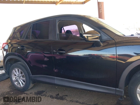 2016 Mazda CX-5 Sport with VIN JM3KE4BY8G0829002, listed as a IAAI auction lot 42553846 with 103,231 mi miles and . Bid and sale history available at DreamBid. Image 14.