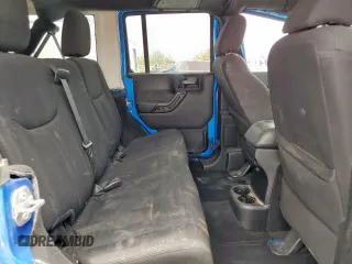 2015 Jeep Wrangler Unlimited Sport с VIN 1C4HJWDG2FL528687, выставлен на аукционе Copart как лот 59174625 с пробегом 87 285 миль миль и На запчасти • Non repairable. История ставок и продаж доступна на DreamBid. Изображение 11.