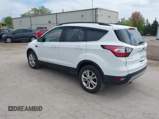 2018 Ford Escape SE z VIN 1FMCU9GDXJUC99453, wystawiony jako IAAI lot #42195202 z przebiegiem 191 840 mil mil oraz . Historia ofert i sprzedaży dostępna na DreamBid. Obrazek 3.