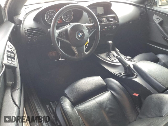 2006 BMW 6 Series 650Ci z VIN WBAEK134X6CN77921, wystawiony jako Copart lot #54093355 z przebiegiem 162 363 mil mil oraz Czysty tytuł • Clean title. Historia ofert i sprzedaży dostępna na DreamBid. Obrazek 8.