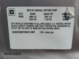 1997 Pontiac Bonneville SE z VIN 1G2HX52K7VH211607, wystawiony jako Copart lot #73705454 z przebiegiem 116 307 mil mil oraz Szkoda całkowita • Salvage title. Historia ofert i sprzedaży dostępna na DreamBid. Obrazek 12.