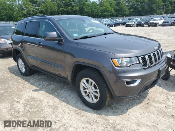 2020 Jeep Grand Cherokee Laredo E with VIN 1C4RJFAGXLC143334, listed as a Copart auction lot 60437345 with 62,484 mi miles and Salvage title. Bid and sale history available at DreamBid. Image 4.