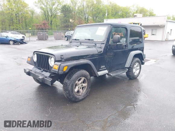 2004 Jeep Wrangler X with VIN 1J4FA39S94P707411, listed as a IAAI auction lot 42187856 with 189,519 mi miles. Bid and sale history available at carsss.com. Image 17.