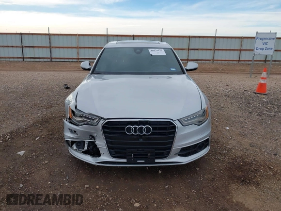 2013 Audi A6 3.0T Prestige with VIN WAUJGAFC8DN015066, listed as a IAAI auction lot 40978422 with 164,992 mi miles. Bid and sale history available at carsss.com. Image 13.
