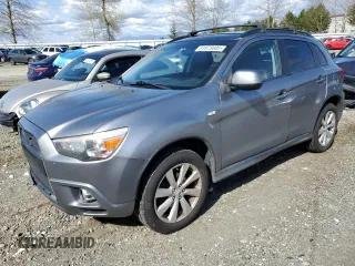 2012 Mitsubishi Outlander SE z VIN JA4AR4AU8CZ005573, wystawiony jako Copart lot #51875805 z przebiegiem 124 038 mil mil oraz Czysty tytuł • Clean title. Historia ofert i sprzedaży dostępna na DreamBid. Obrazek 1.