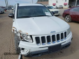 2012 Jeep Compass Latitude with VIN 1C4NJDEB9CD612599, listed as a IAAI auction lot 41582214 with 138,312 mi miles. Bid and sale history available at carsss.com. Image 6.