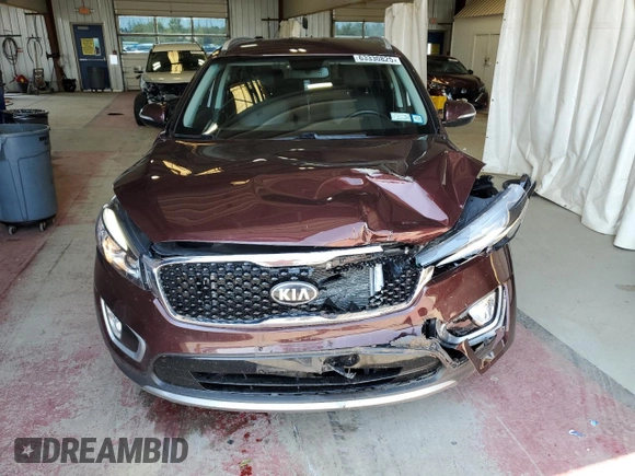 2018 Kia Sorento EX z VIN 5XYPHDA53JG395215, wystawiony jako Copart lot #63330825 z przebiegiem 71 799 mil mil oraz Szkoda całkowita • Salvage title. Historia ofert i sprzedaży dostępna na DreamBid. Obrazek 5.