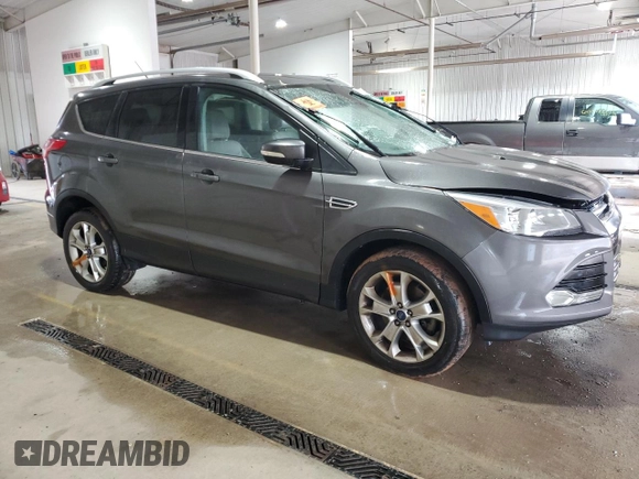 2015 Ford Escape Titanium with VIN 1FMCU9J93FUC86300, listed as a Copart auction lot 60852895 with 156,296 mi miles and Salvage title. Bid and sale history available at DreamBid. Image 4.