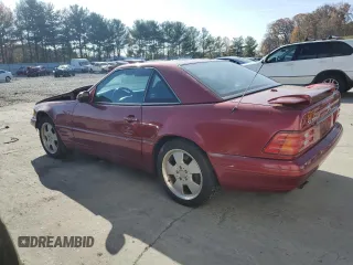 2000 Mercedes-Benz SL-Class with VIN WDBFA68FXYF193901, listed as a Copart auction lot 79173514 with 143,019 mi miles and Salvage Title. Bid and sale history available at carsss.com. Image 2.
