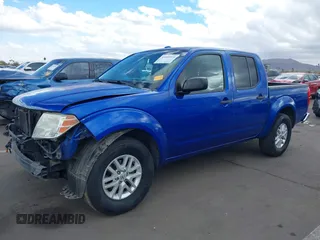 2014 Nissan Frontier SV with VIN 1N6AD0ER1EN765693, listed as a IAAI auction lot 41560914 with 165,572 mi miles and . Bid and sale history available at DreamBid. Image 2.