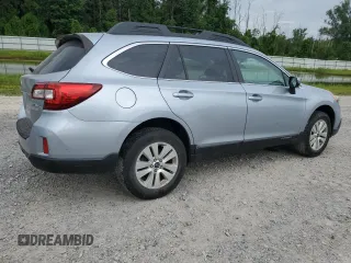 2015 Subaru Outback Premium with VIN 4S4BSAFC4F3303943, listed as a Copart auction lot 62279865 with 128,194 mi miles and Salvage title. Bid and sale history available at DreamBid. Image 3.