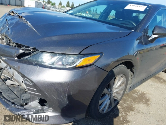 2019 Toyota Camry LE with VIN 4T1B11HK4KU254853, listed as a IAAI auction lot 42013255 with 153,664 mi miles and . Bid and sale history available at DreamBid. Image 20.