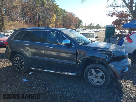 2018 Jeep Grand Cherokee Limited with VIN 1C4RJFBG6JC246293, listed as a IAAI auction lot 40846527 with 114,544 mi miles and . Bid and sale history available at DreamBid. Image 13.