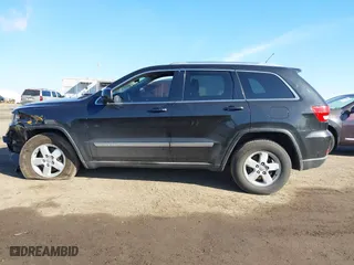 2012 Jeep Grand Cherokee Laredo with VIN 1C4RJFAG5CC118826, listed as a IAAI auction lot 42039801 with 158,153 mi miles. Bid and sale history available at carsss.com. Image 14.