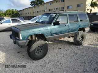 1998 Jeep Cherokee z VIN 1J4FT78S8XL520854, wystawiony jako Copart lot #79304214 z przebiegiem 111 674 mil mil oraz Czysty tytuł • Clean title. Historia ofert i sprzedaży dostępna na DreamBid. Obrazek 1.