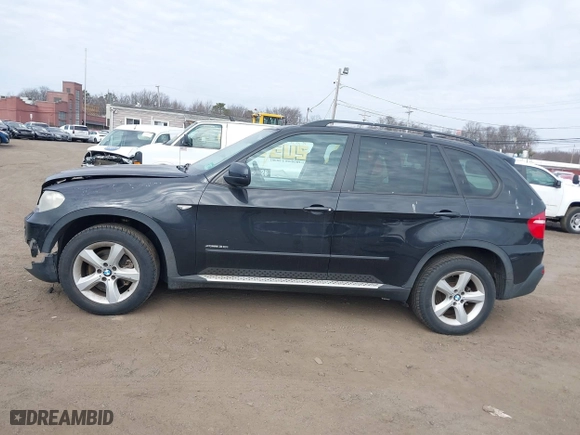 2009 BMW X5 30i with VIN 5UXFE43579L037535, listed as a IAAI auction lot 41715317 with 210,697 mi miles. Bid and sale history available at carsss.com. Image 14.