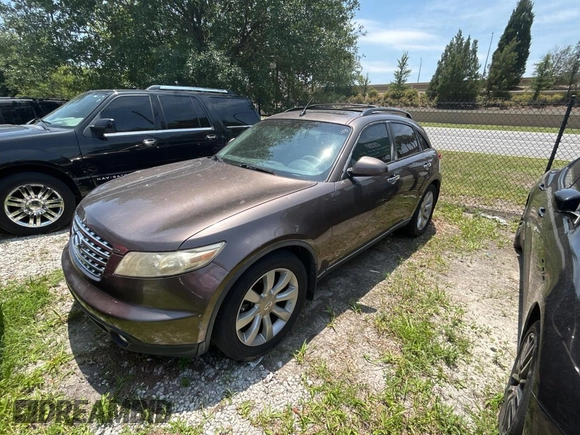 2003 Infiniti FX Options z VIN JNRAS08W93X205643, wystawiony jako Copart lot #58410885 z przebiegiem 210 110 mil mil oraz Tytuł czysty. Historia ofert i sprzedaży dostępna na DreamBid. Obrazek 2.