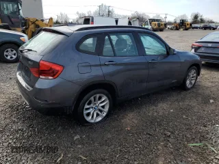 2015 BMW X1 xDrive28i with VIN WBAVL1C5XFVY31265, listed as a Copart auction lot 47543025 with 124,986 mi miles and Salvage Title. Bid and sale history available at carsss.com. Image 3.