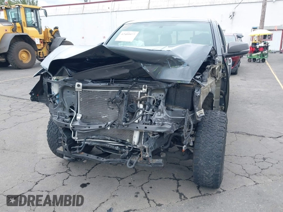 2017 Toyota Tacoma SR5 with VIN 3TMDZ5BN3HM027098, listed as a IAAI auction lot 42409977 with 97,224 mi miles and . Bid and sale history available at DreamBid. Image 6.