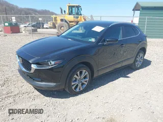 2023 Mazda CX-30 S Carbon Edition with VIN 3MVDMBCM1PM509987, listed as a IAAI auction lot 42060833 with 14,140 mi miles and . Bid and sale history available at DreamBid. Image 2.