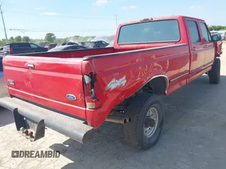 1997 Ford F-350 z VIN 1FTJW36G5VEC23170, wystawiony jako IAAI lot #42013727 z przebiegiem 318 411 mil mil oraz . Historia ofert i sprzedaży dostępna na DreamBid. Obrazek 4.