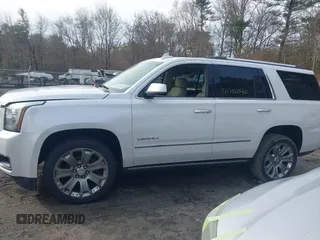 2016 GMC Yukon Denali with VIN 1GKS2CKJ9GR334645, listed as a IAAI auction lot 41781040 with 141,405 mi miles. Bid and sale history available at carsss.com. Image 14.