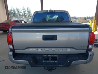 2018 Toyota Tacoma SR with VIN 3TMCZ5ANXJM146284, listed as a IAAI auction lot 42041525 with 103,143 mi miles and . Bid and sale history available at DreamBid. Image 17.