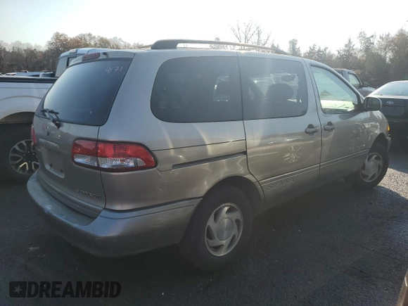 2002 Toyota Sienna LE with VIN 4T3ZF13C52U458553, listed as a Copart auction lot 77957754 with 164,058 mi miles and Salvage Title. Bid and sale history available at carsss.com. Image 3.