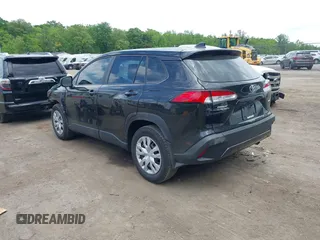 2023 Toyota Corolla Cross L z VIN 7MUAAABG8PV056556, wystawiony jako IAAI lot #42212865 z przebiegiem 13 948 mil mil oraz . Historia ofert i sprzedaży dostępna na DreamBid. Obrazek 3.